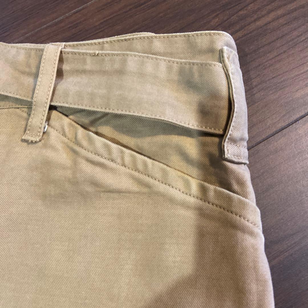 COMOLI ベージュ チノパン ベルト付き 前開き
