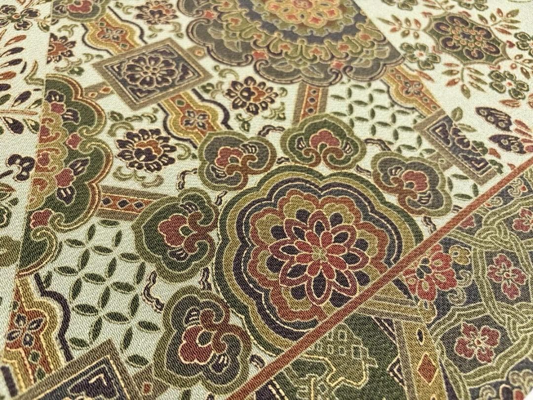 C 美品 唐草唐花 華文 更紗 山葵色系 縮緬 正絹 六通 名古屋帯 カジュアル