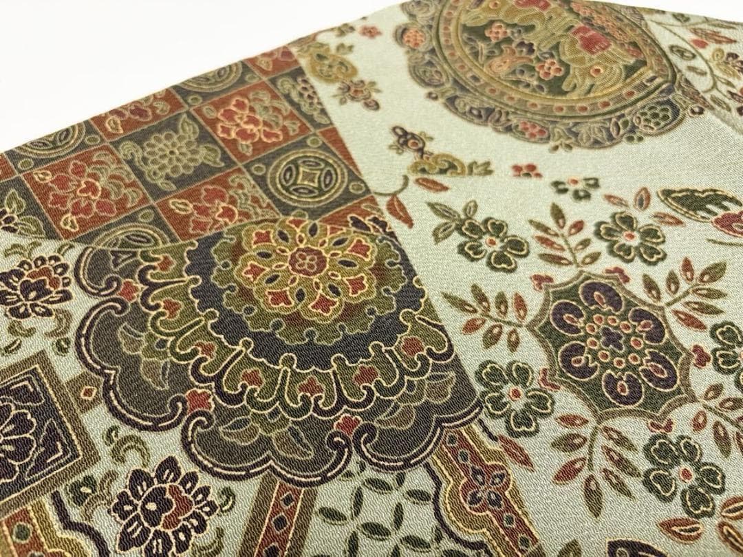 C 美品 唐草唐花 華文 更紗 山葵色系 縮緬 正絹 六通 名古屋帯 カジュアル