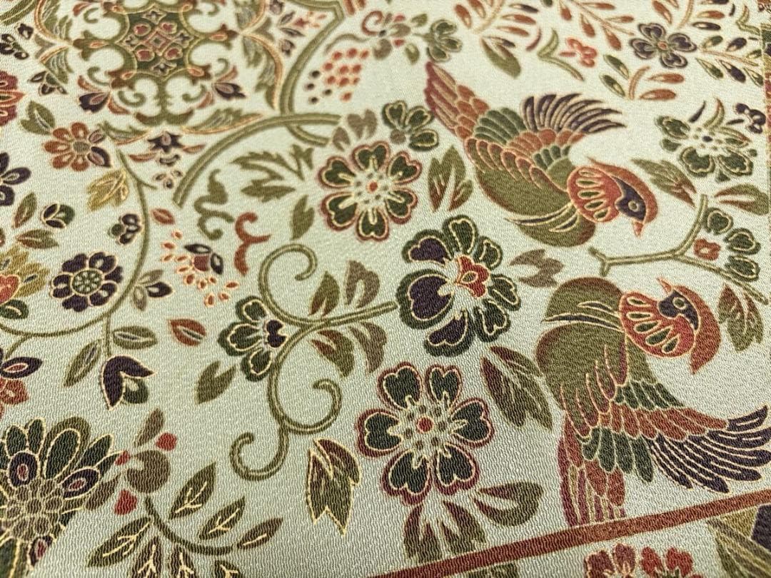 C 美品 唐草唐花 華文 更紗 山葵色系 縮緬 正絹 六通 名古屋帯 カジュアル