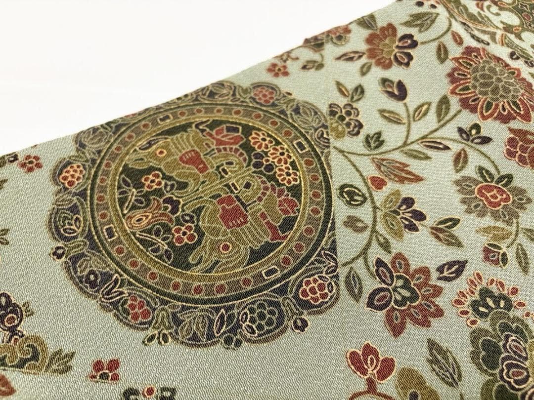 C 美品 唐草唐花 華文 更紗 山葵色系 縮緬 正絹 六通 名古屋帯 カジュアル