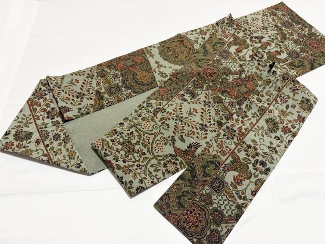 C 美品 唐草唐花 華文 更紗 山葵色系 縮緬 正絹 六通 名古屋帯 カジュアル