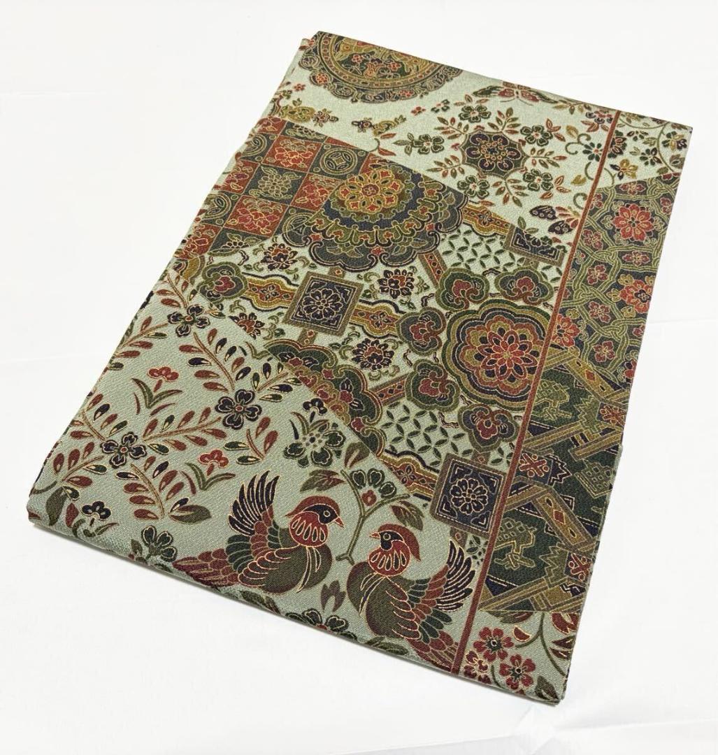 C 美品 唐草唐花 華文 更紗 山葵色系 縮緬 正絹 六通 名古屋帯 カジュアル