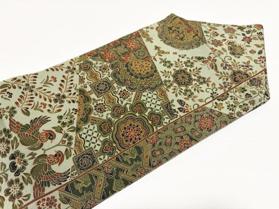 C 美品 唐草唐花 華文 更紗 山葵色系 縮緬 正絹 六通 名古屋帯 カジュアル