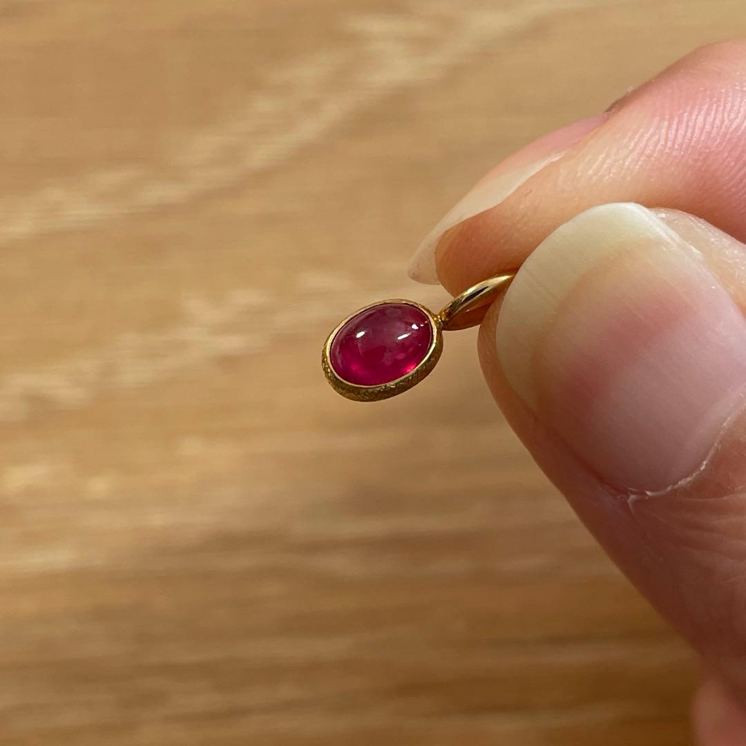 ハリックァ　ルビーオーバルチャーム(18金)