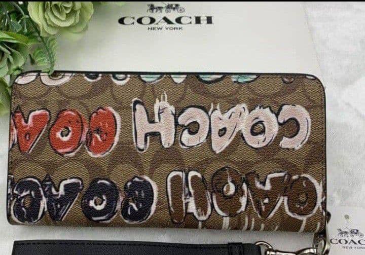 新品未使用コーチ長財布シグネチャーロングジップブラウンレディース送料無料即日発送