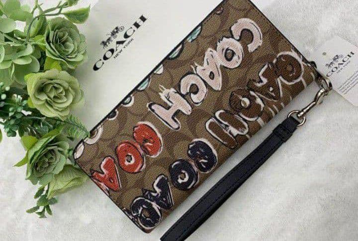 新品未使用コーチ長財布シグネチャーロングジップブラウンレディース送料無料即日発送