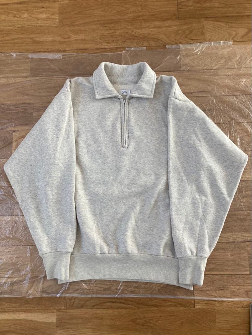シオタ ハーフジップスウェットシャツ ユニセックス