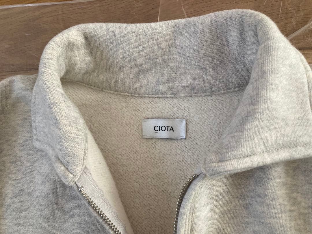 シオタ ハーフジップスウェットシャツ ユニセックス