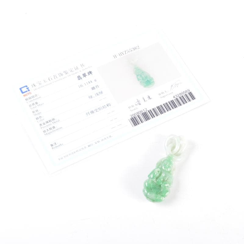 かぼちゃもち玉石翡翠玉彫刻　釈迦如来像　仏像　根付　鑑定書付　C　4642