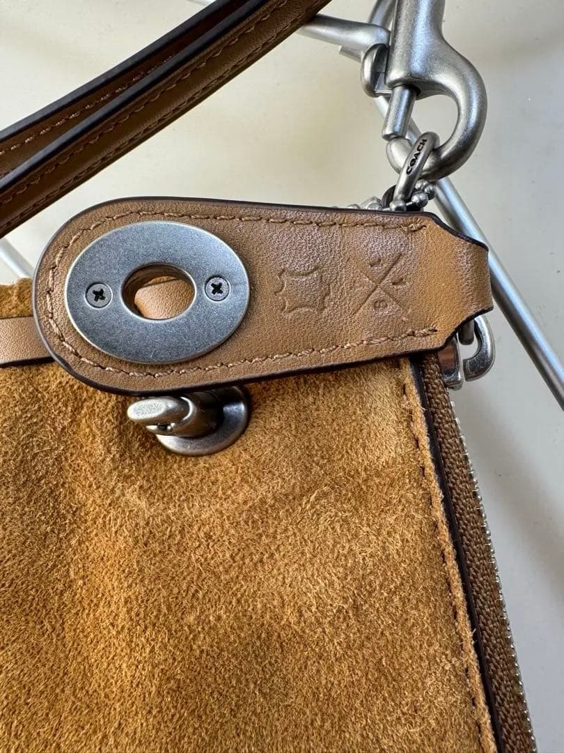 COACH フリンジ　スウェードターンロックリストレット30 クラッチ　↓8万円