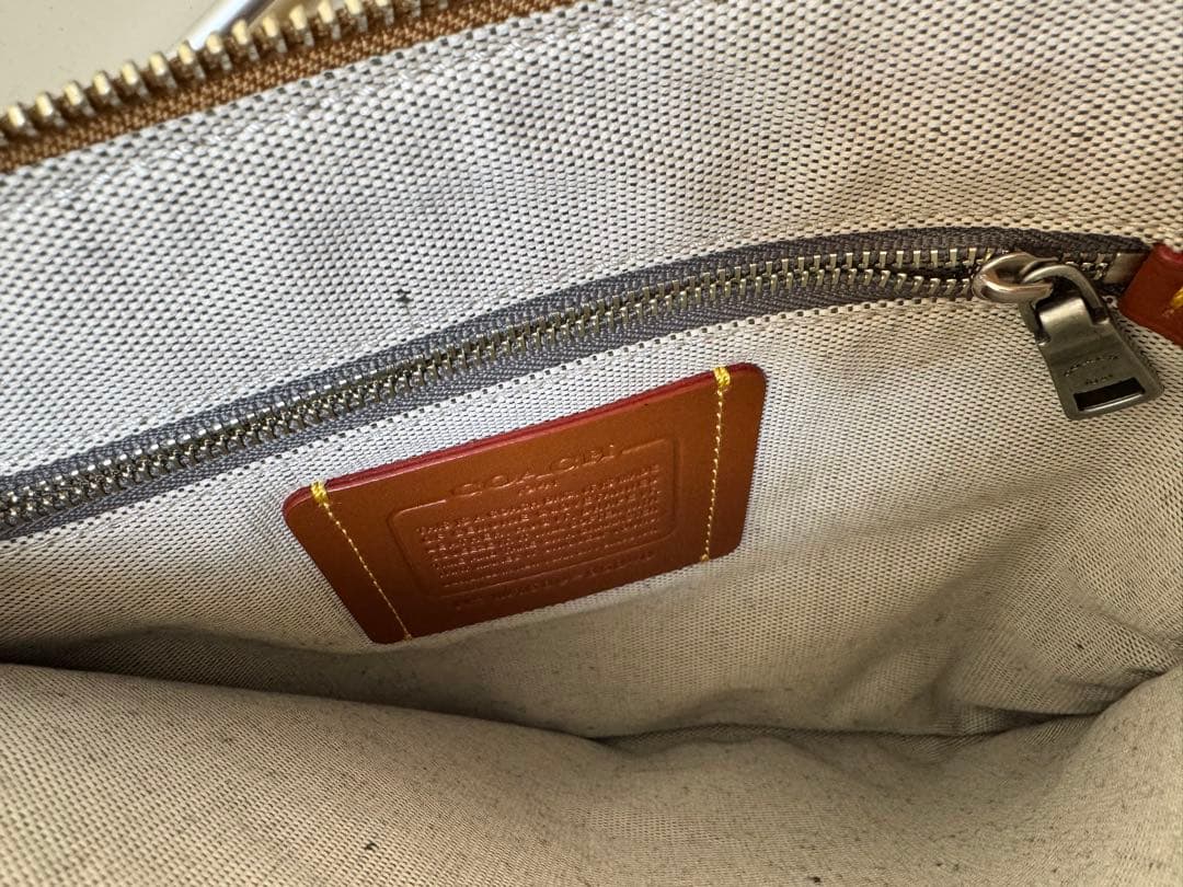 COACH フリンジ　スウェードターンロックリストレット30 クラッチ　↓8万円