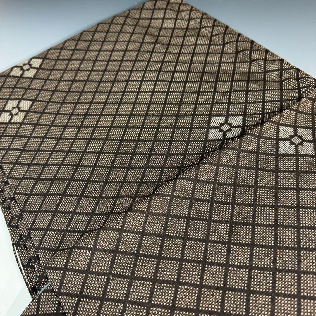 【未使用】本場奄美大島紬 純泥染 泥大島紬着物 しつけ糸付 証紙付き