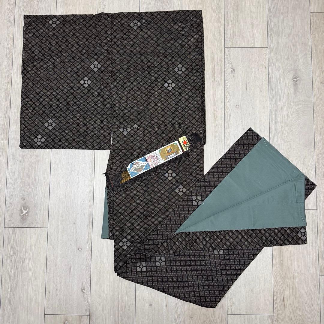 【未使用】本場奄美大島紬 純泥染 泥大島紬着物 しつけ糸付 証紙付き