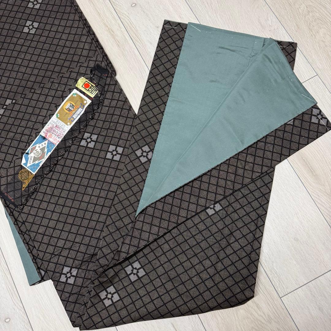 【未使用】本場奄美大島紬 純泥染 泥大島紬着物 しつけ糸付 証紙付き