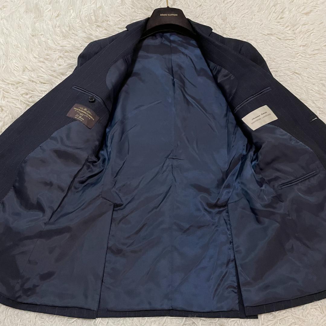 美品 ユニバーサルランゲージ カノニコ21ミクロン セットアップ ネイビー系 M