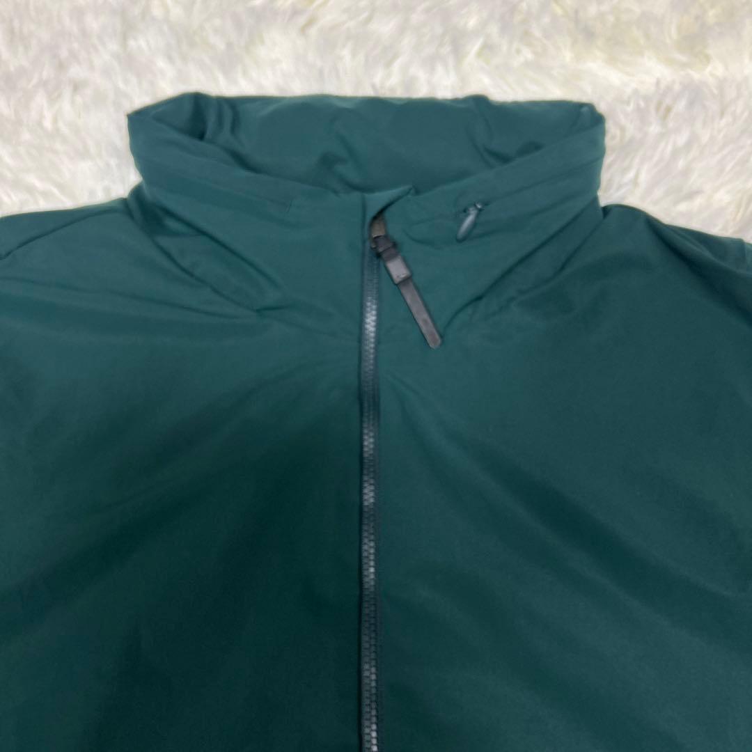 KJUS チュース　ジップアップジャケット　ダークグリーン　フード収納付き　M