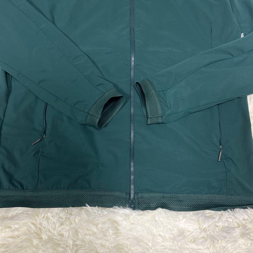 KJUS チュース　ジップアップジャケット　ダークグリーン　フード収納付き　M