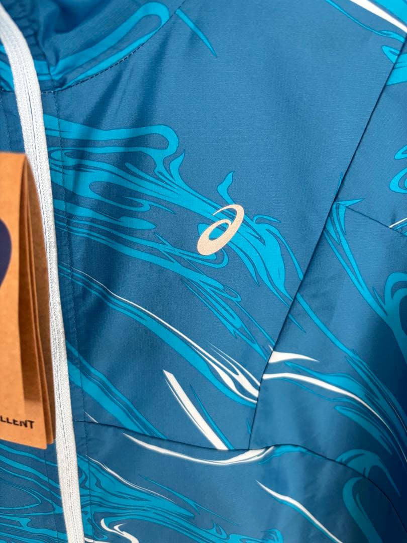 ASICS アシックス　撥水性グラフィックウーブンジャケット　Sサイズ　水色
