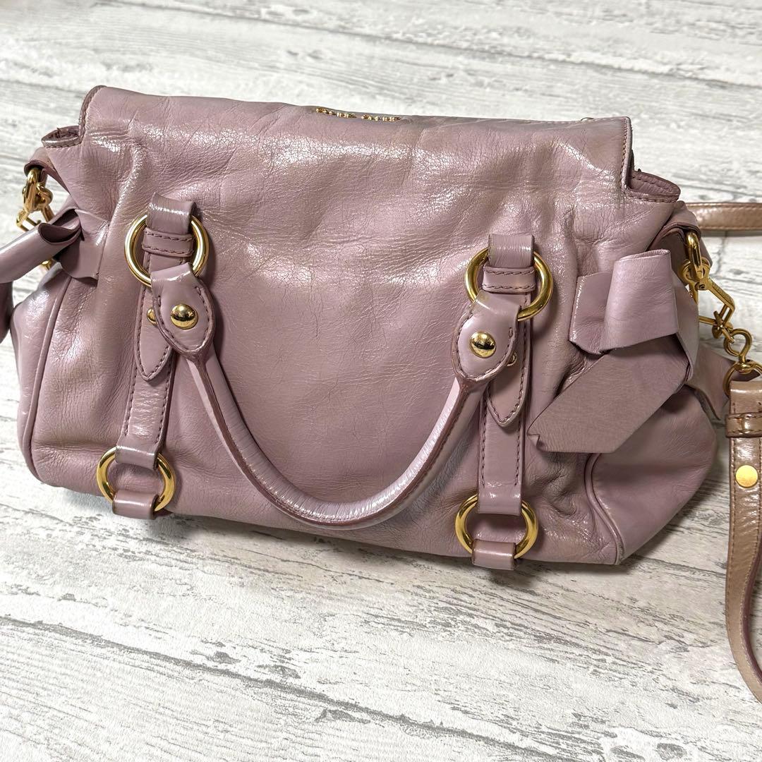 miu miu（ミュウミュウ）サイドリボン レザー 2way ショルダーバッグ♤