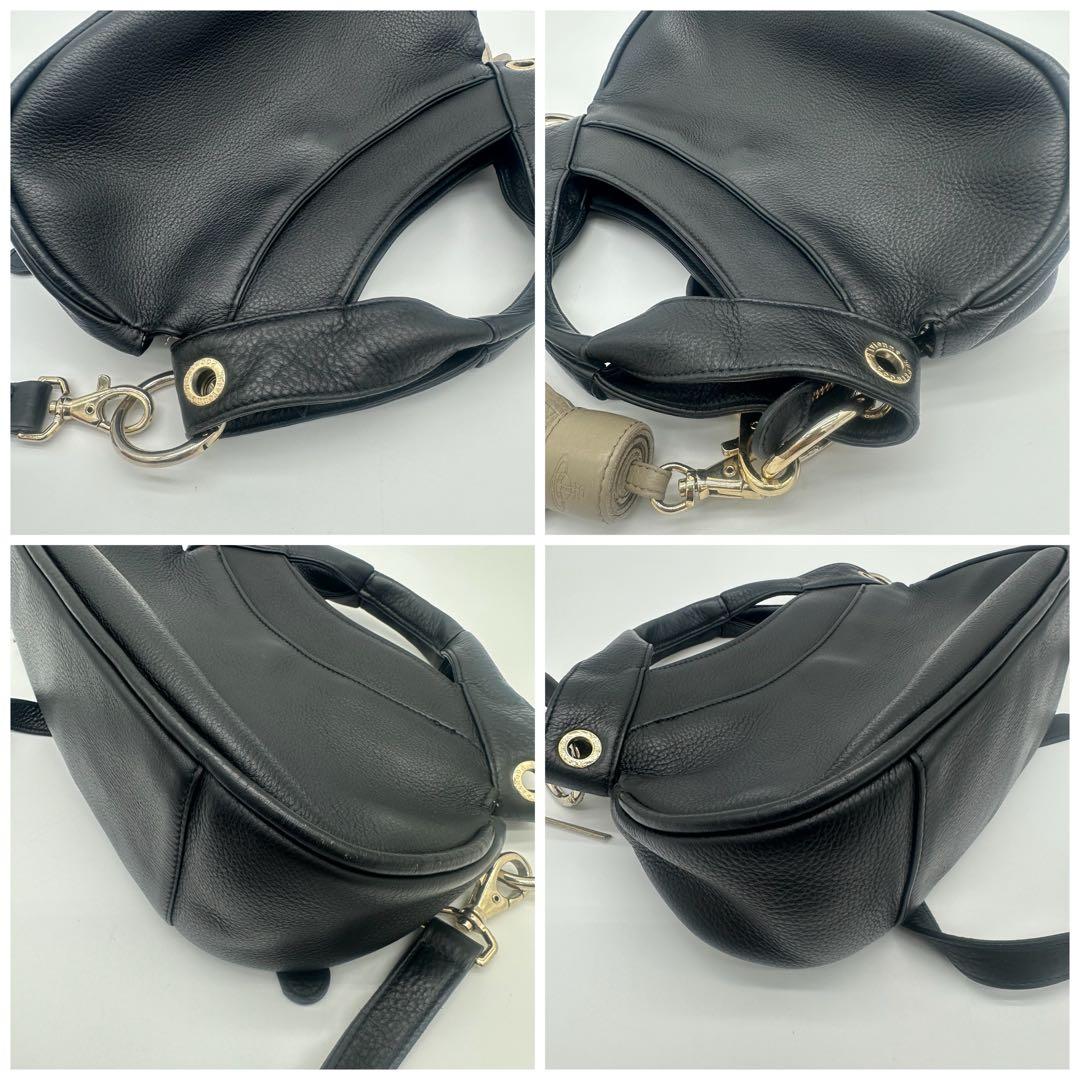 たま(=^_^=) Vivienne Westwood 黒レザー タッセル