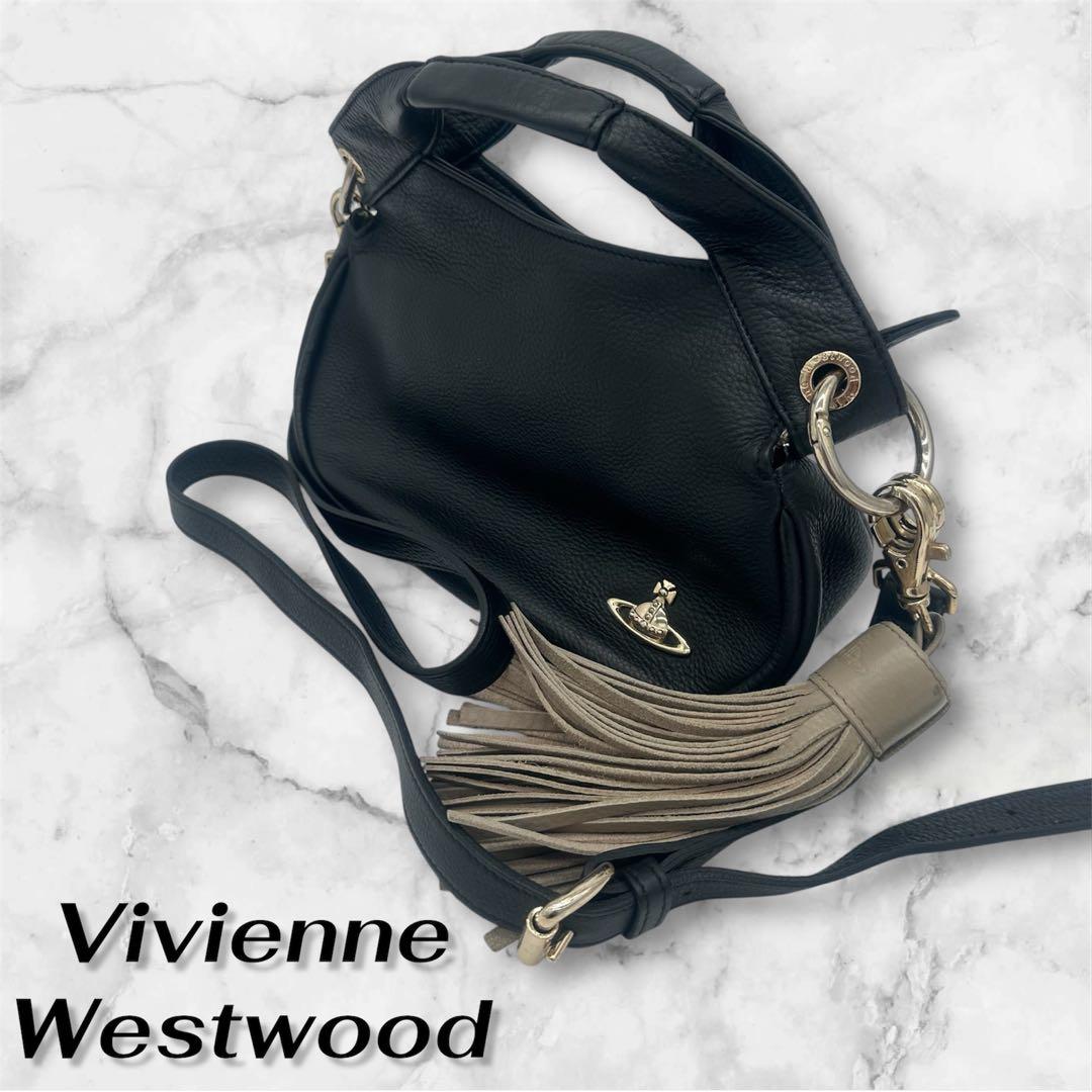 たま(=^_^=) Vivienne Westwood 黒レザー タッセル