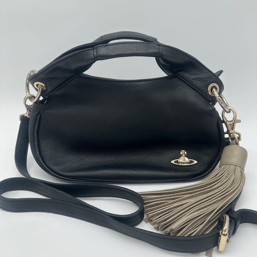 たま(=^_^=) Vivienne Westwood 黒レザー タッセル