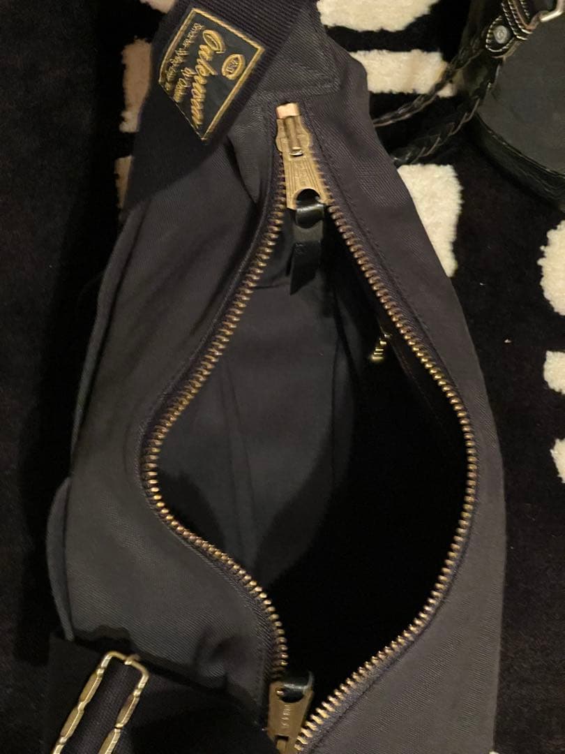 アキ クッシュマン40'sボディバッグ　ニュースペーパー バッグ