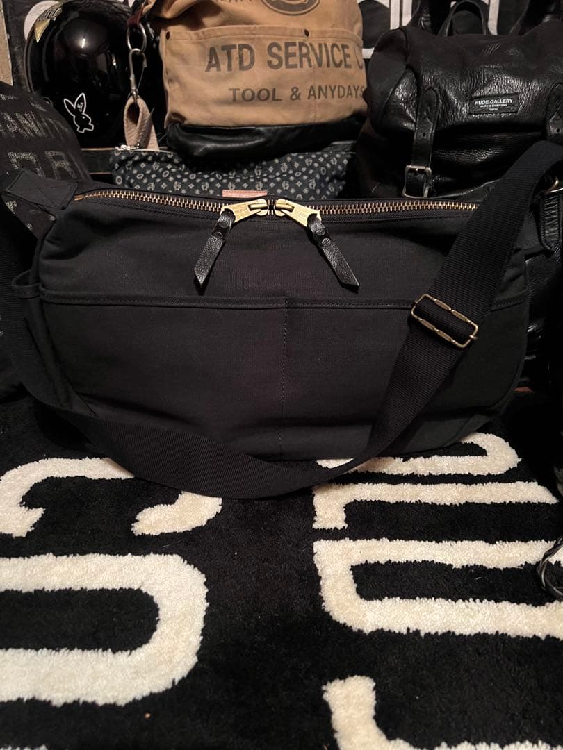 アキ クッシュマン40'sボディバッグ　ニュースペーパー バッグ