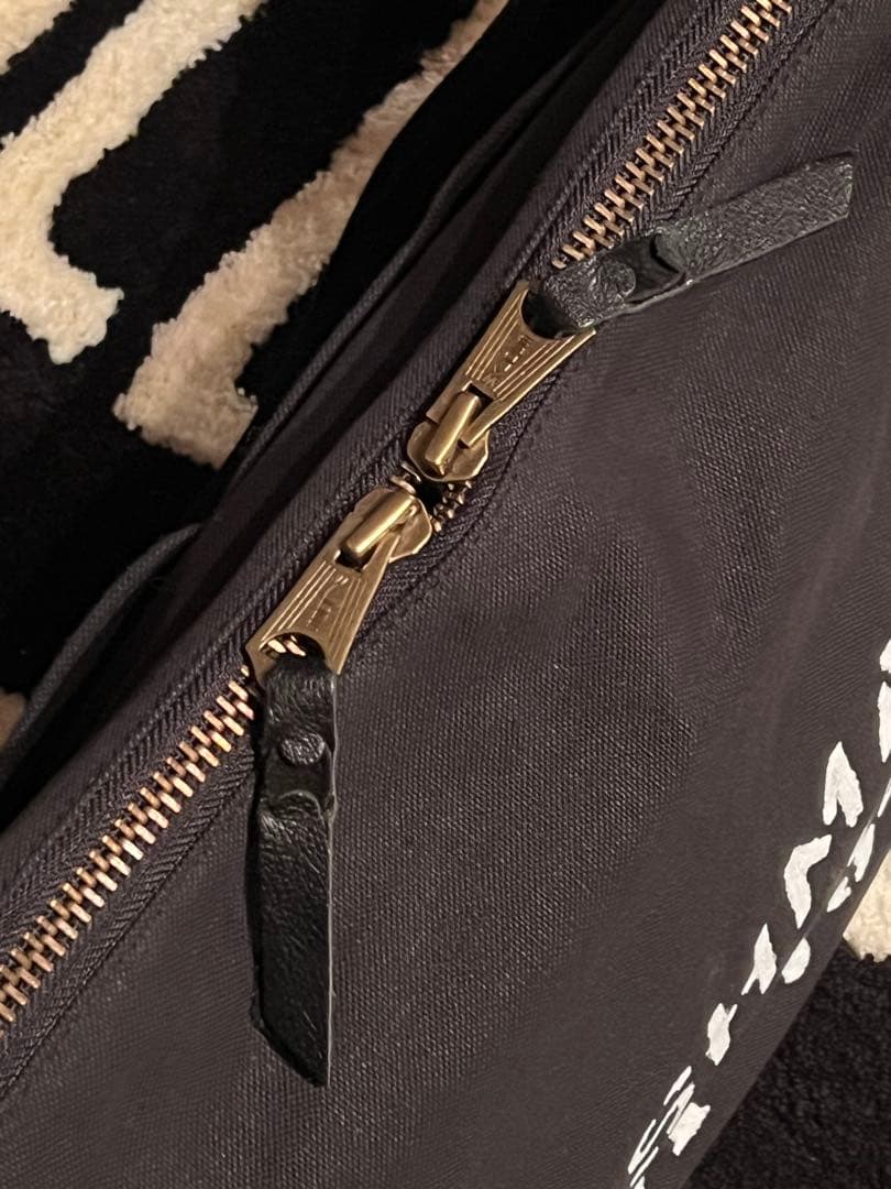 アキ クッシュマン40'sボディバッグ　ニュースペーパー バッグ