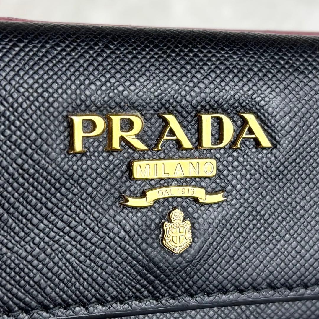 【希少✨】PRADA 三つ折り財布 バイカラー サフィアーノレザー 黒 ピンク