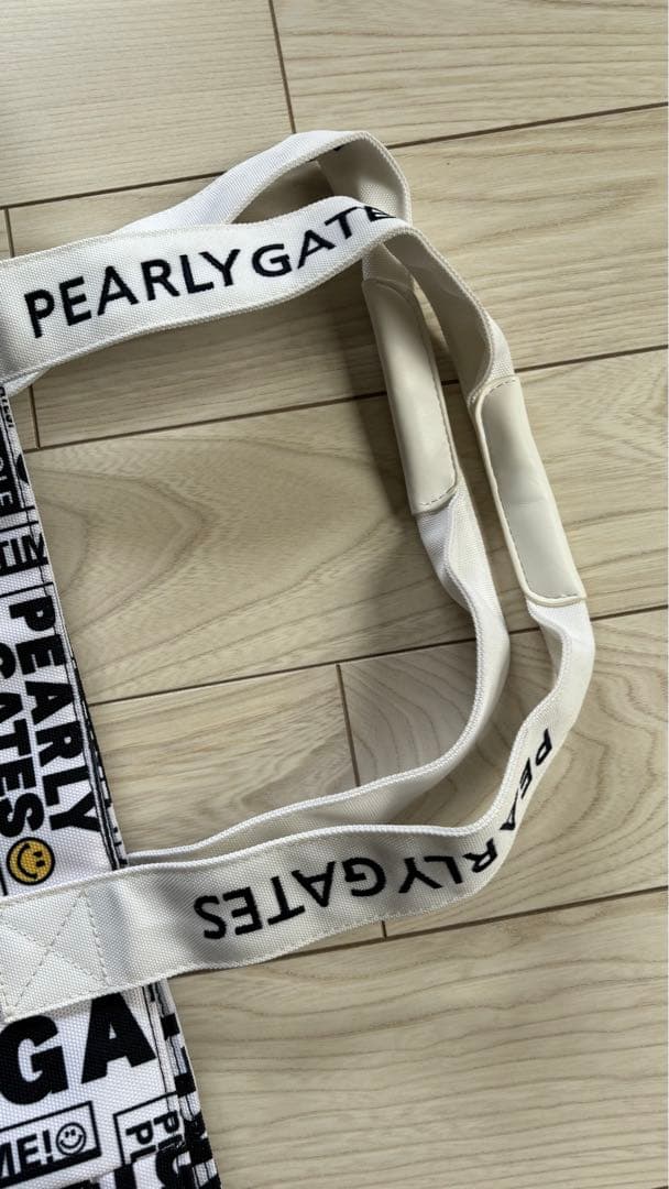 パーリーゲイツ　ロッカーバック　ニュースペーパー柄