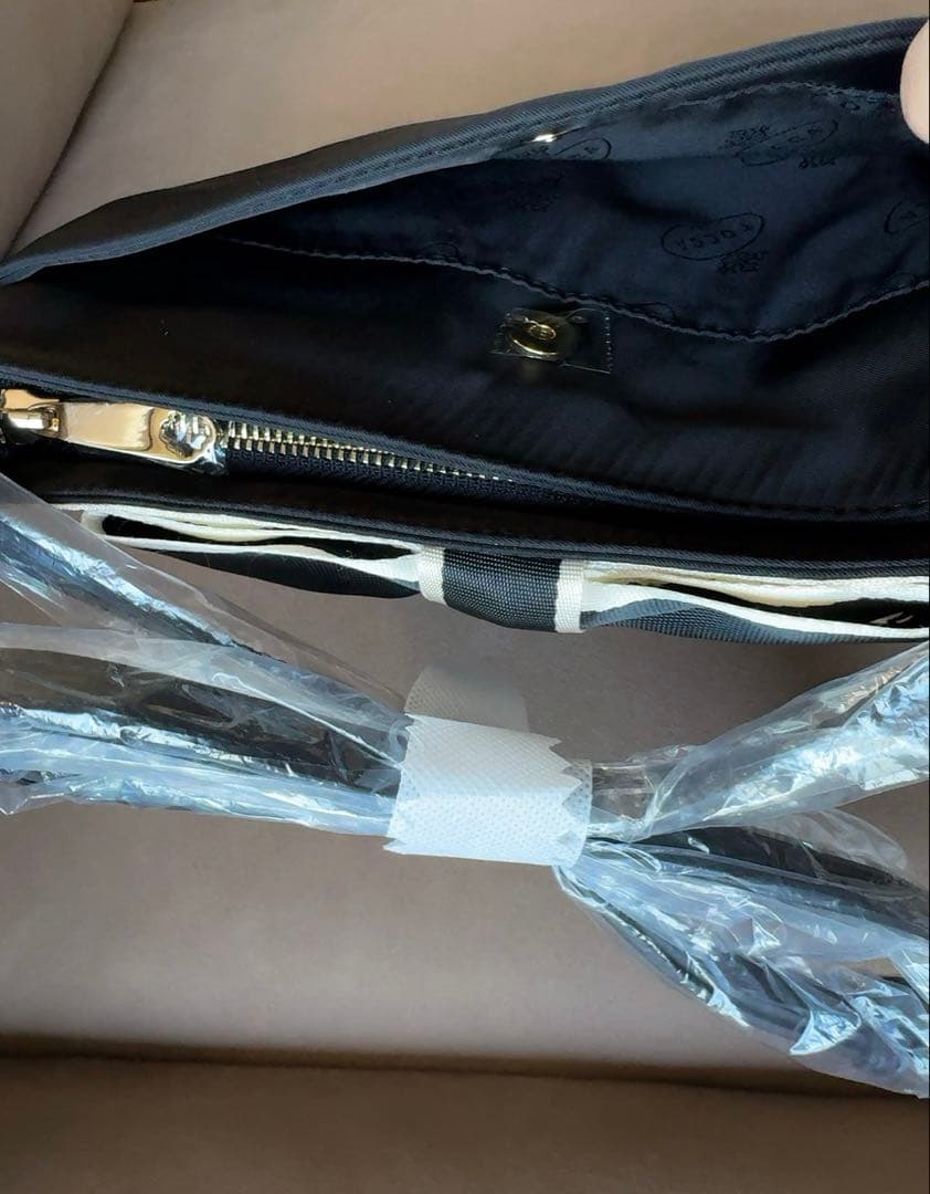 Mari BICOLOR RIBBON POCHETTE ポシェット