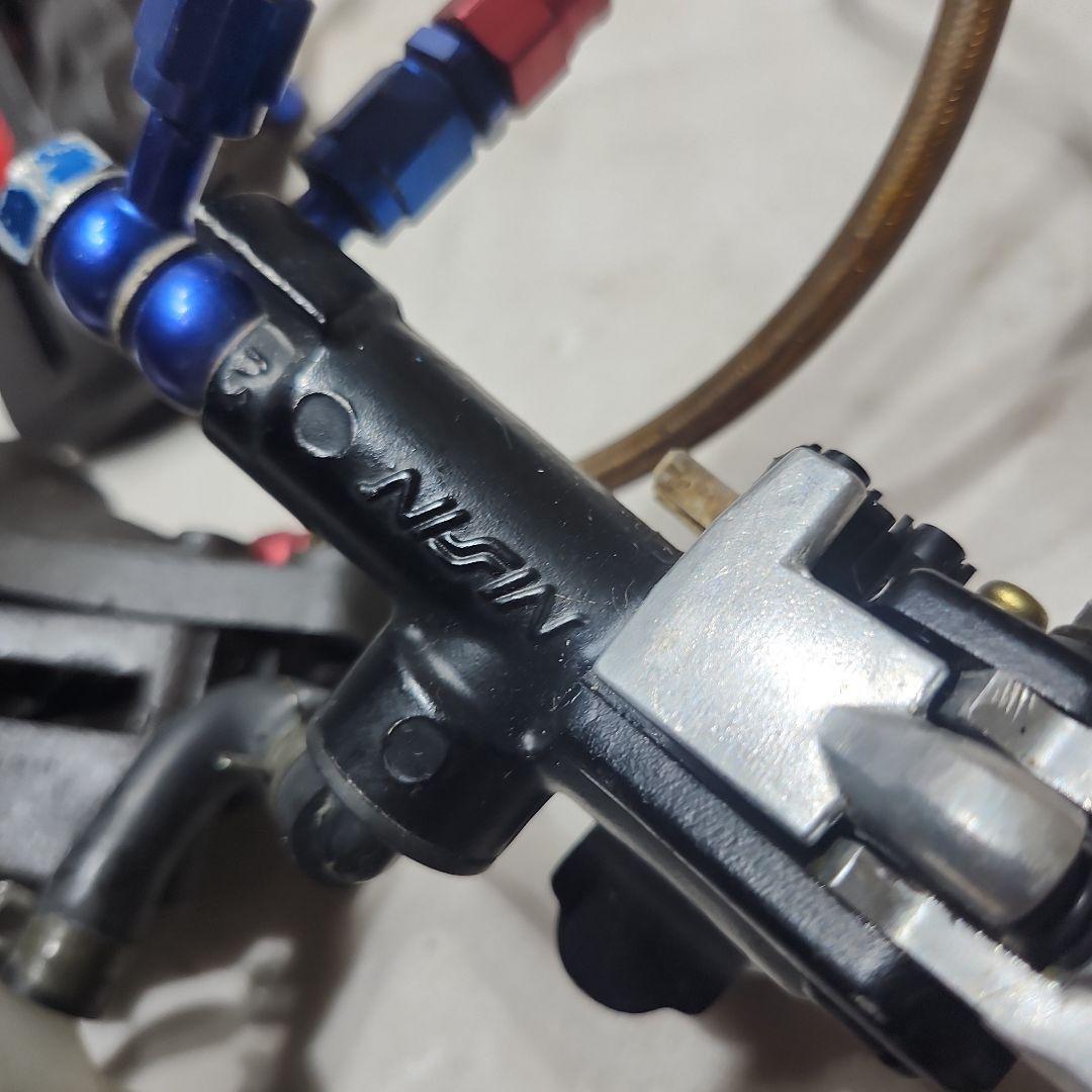 NISSIN ブレーキキャリパー ピッチ90 de11