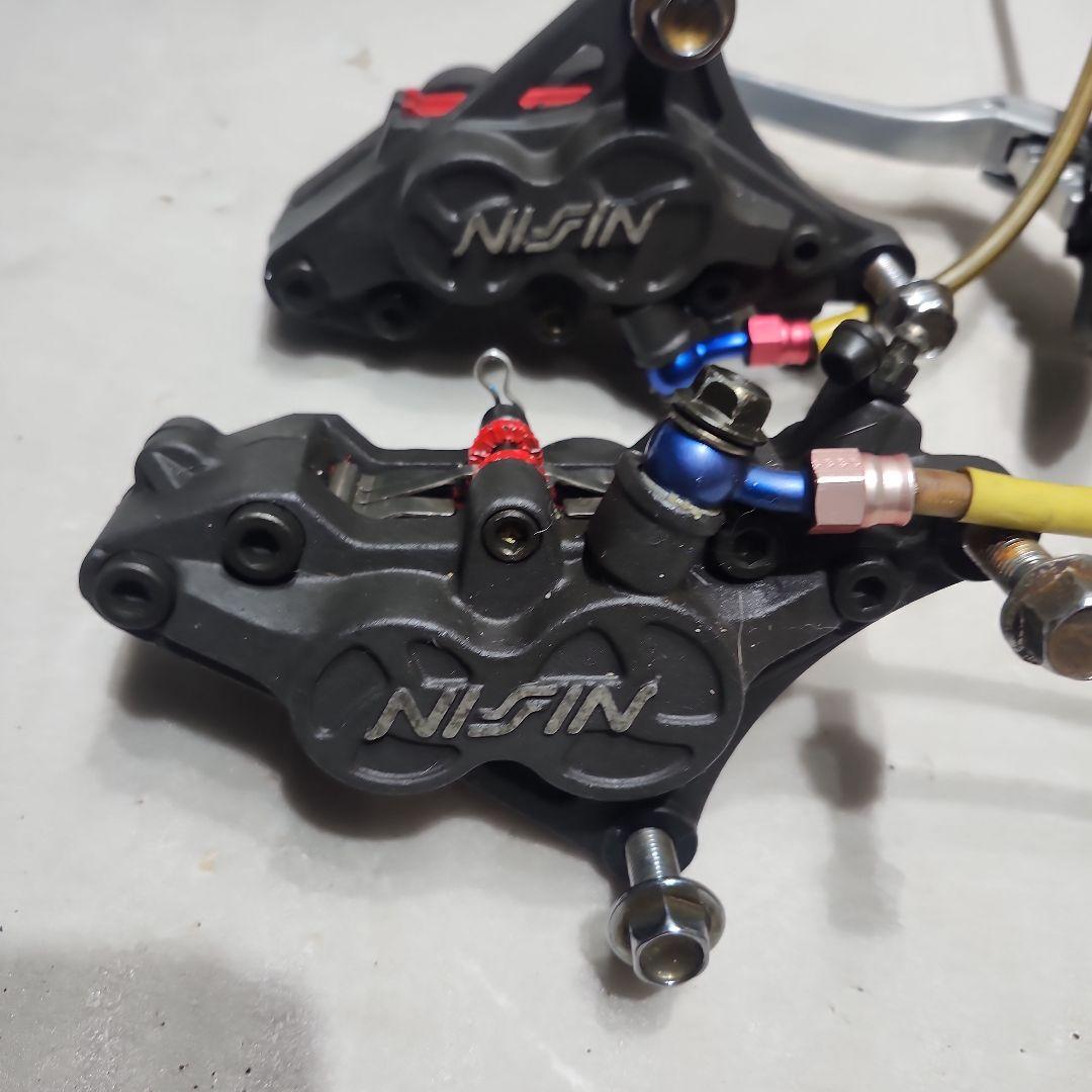 NISSIN ブレーキキャリパー ピッチ90 de11