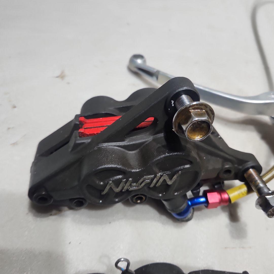 NISSIN ブレーキキャリパー ピッチ90 de11