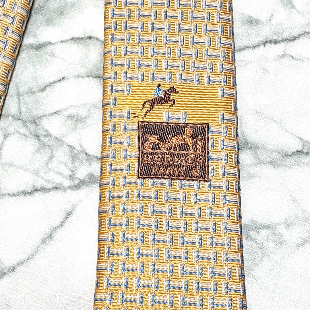 ✨未使用タグ付き箱付き✨エルメス　H柄 小剣ホース柄　ライトオレンジ　ネクタイ