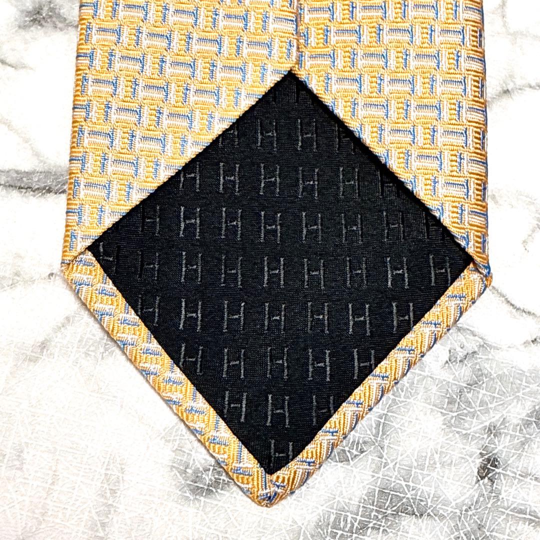 ✨未使用タグ付き箱付き✨エルメス　H柄 小剣ホース柄　ライトオレンジ　ネクタイ