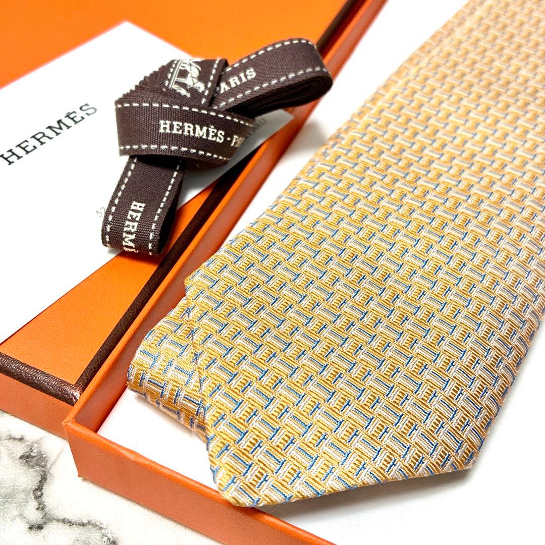 ✨未使用タグ付き箱付き✨エルメス　H柄 小剣ホース柄　ライトオレンジ　ネクタイ