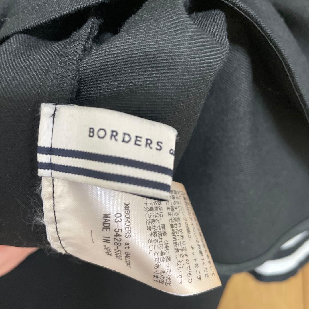 ボーダーズアットバルコニー 黒の五分袖チュニック ストライプ袖口