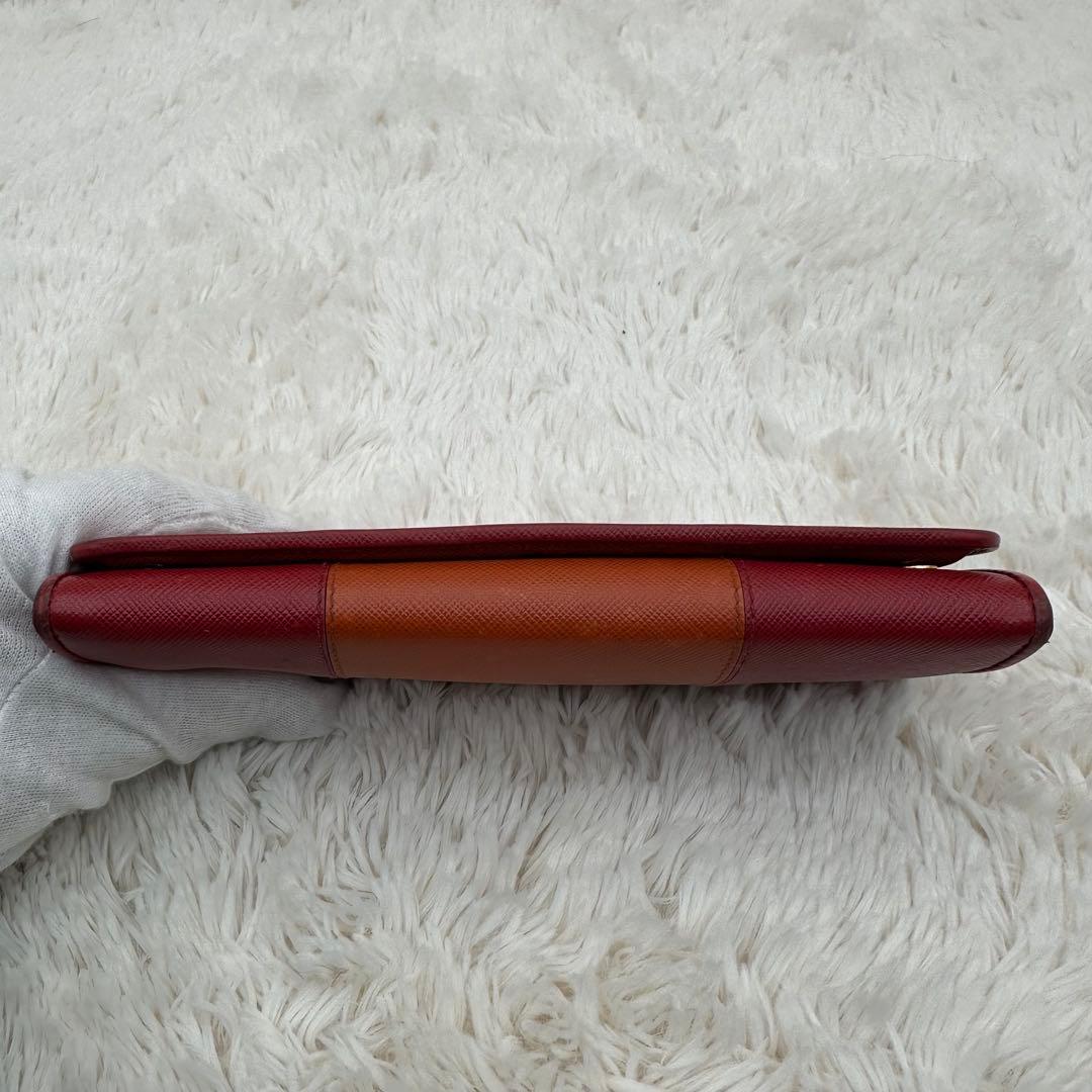 ✨美品✨プラダ　長財布　メタルロゴ　バイカラー　サフィアーノレザー　赤　オレンジ