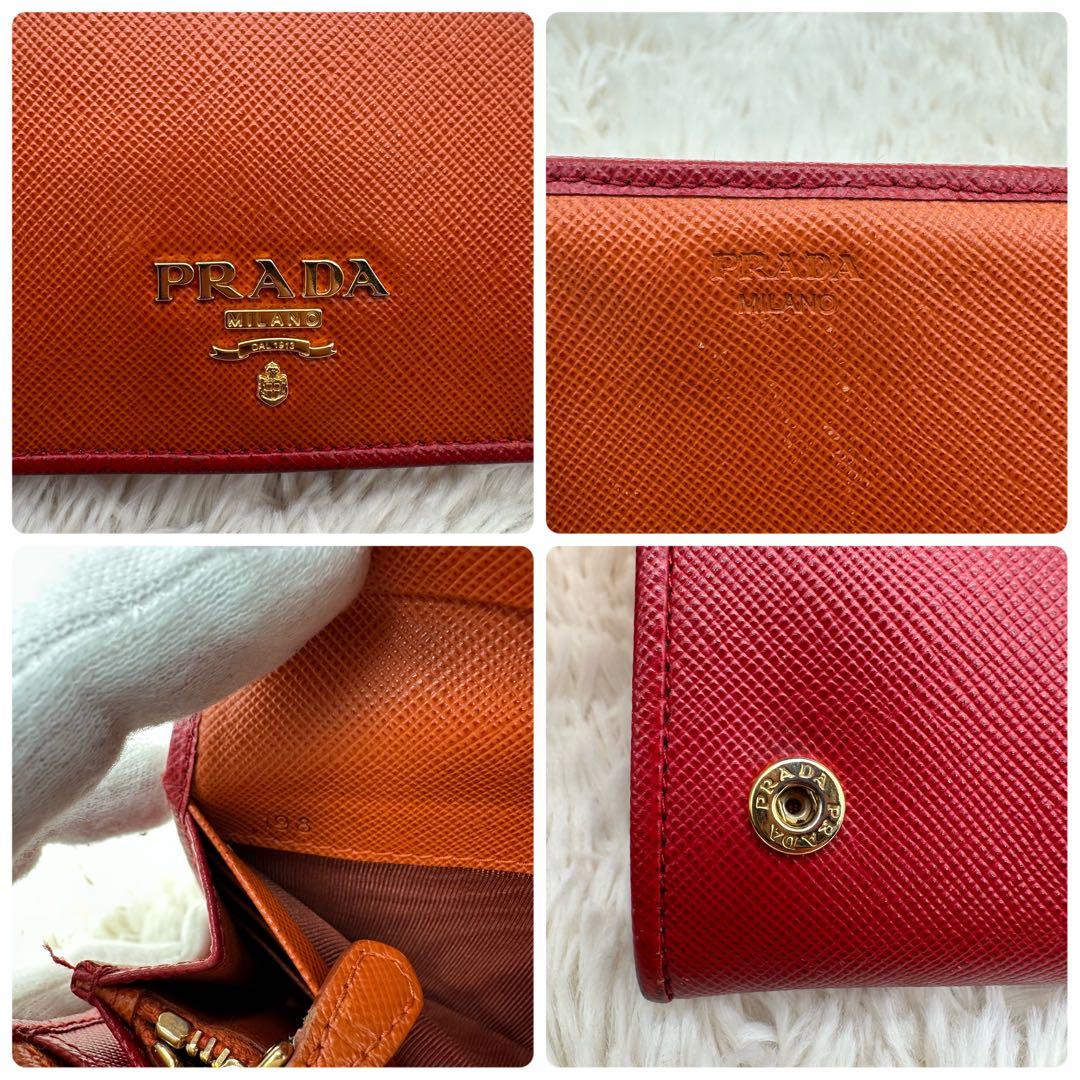 ✨美品✨プラダ　長財布　メタルロゴ　バイカラー　サフィアーノレザー　赤　オレンジ