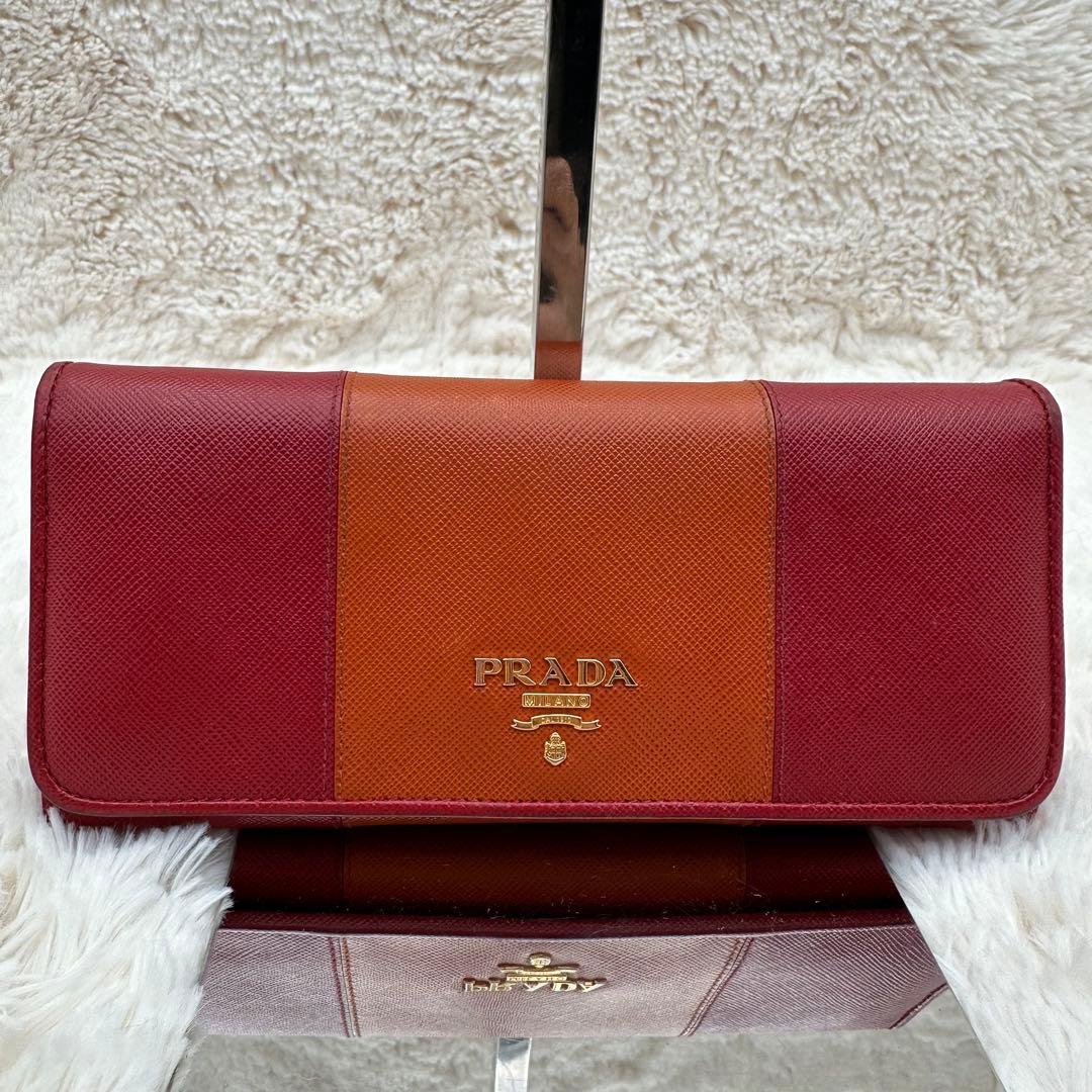 ✨美品✨プラダ　長財布　メタルロゴ　バイカラー　サフィアーノレザー　赤　オレンジ