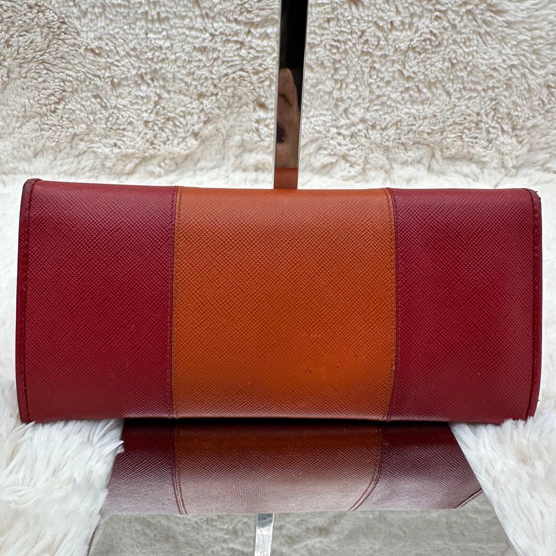 ✨美品✨プラダ　長財布　メタルロゴ　バイカラー　サフィアーノレザー　赤　オレンジ