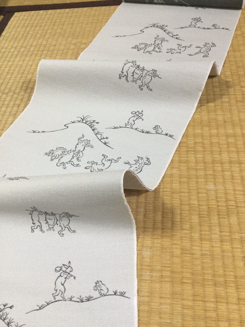 素敵な装い！西陣名古屋帯 綿芯仕立、ガード加工済「鳥獣人物戯画」薄グレー簡易包装