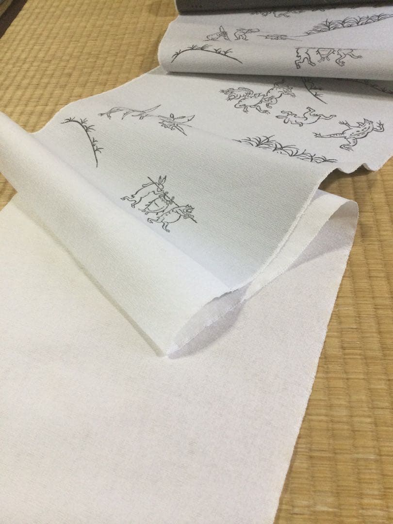 素敵な装い！西陣名古屋帯 綿芯仕立、ガード加工済「鳥獣人物戯画」薄グレー簡易包装