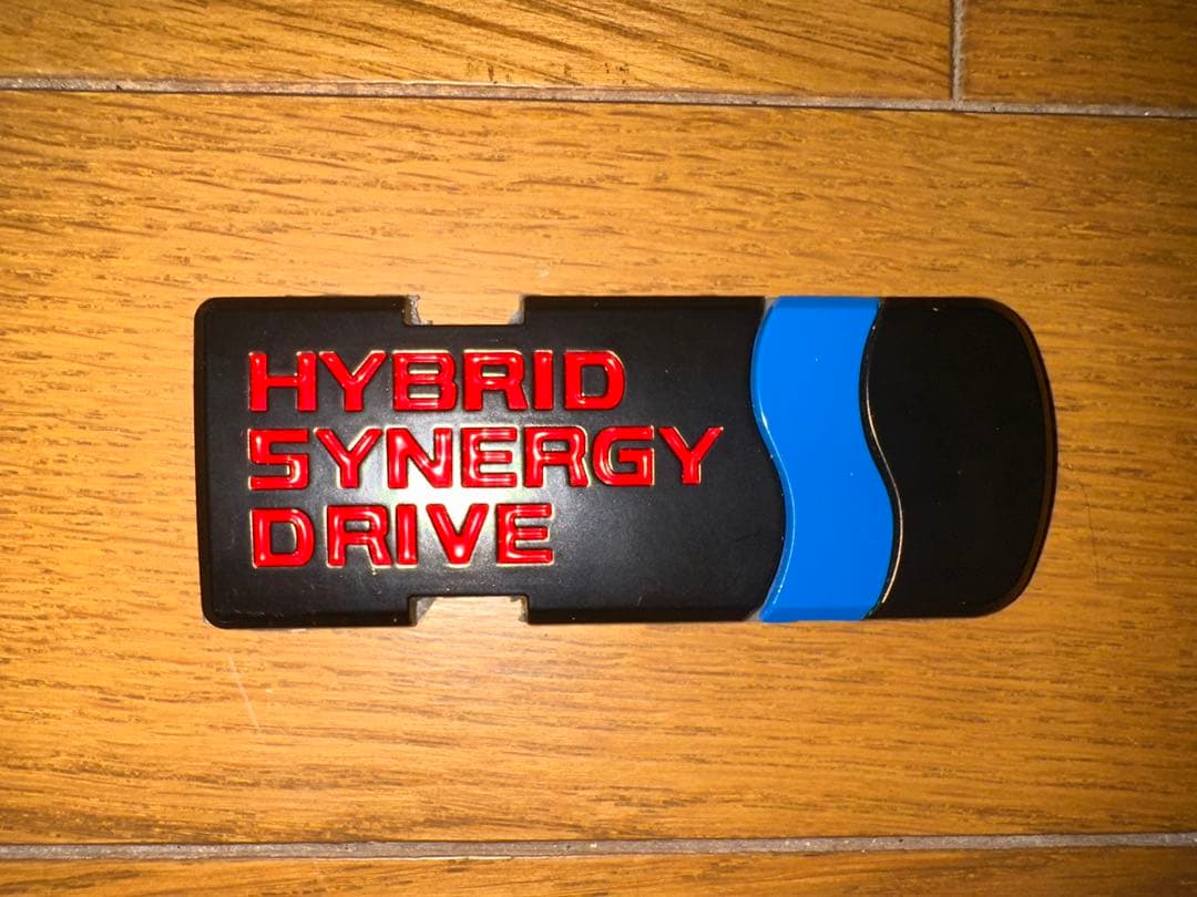 プリウスα用モデリスタ製リアランプカバー黒ハイブリッドエンブレム付dai