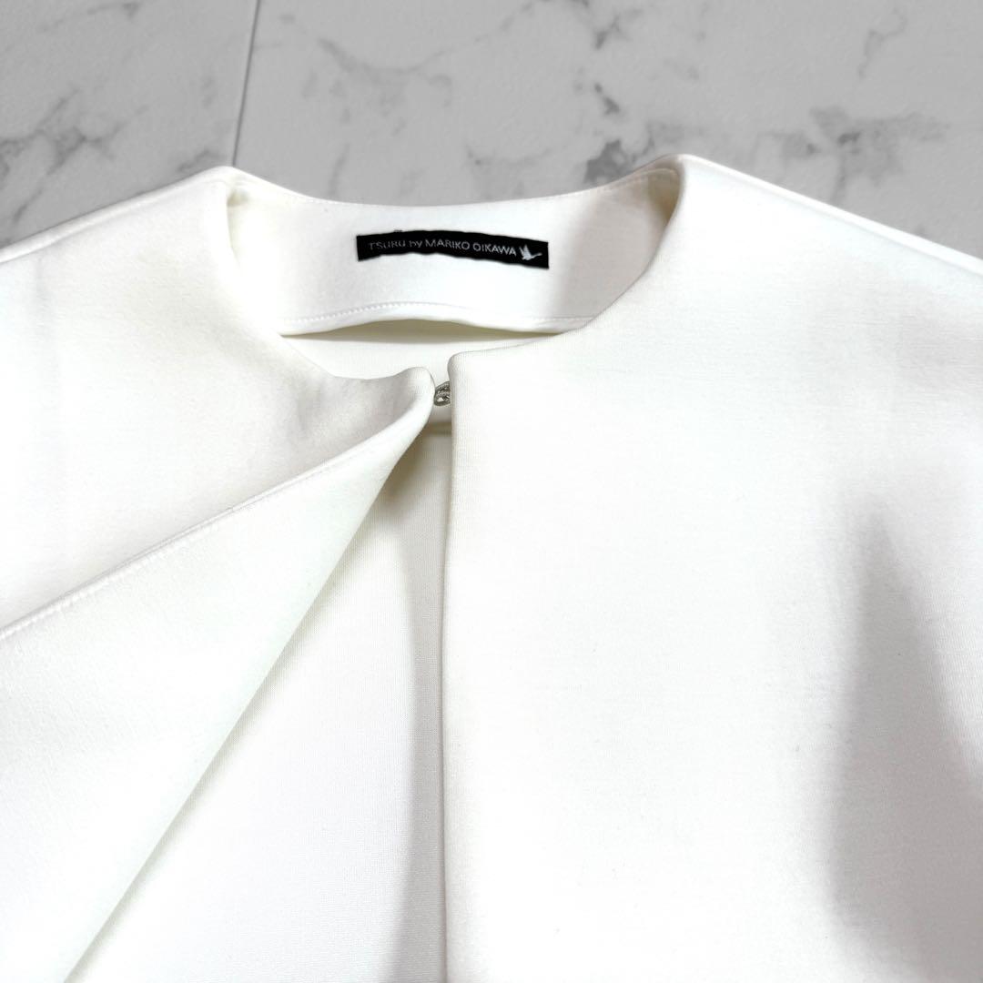 ツルバイマリコオイカワ ティアード ノーカラージャケット ホワイト ペプラム
