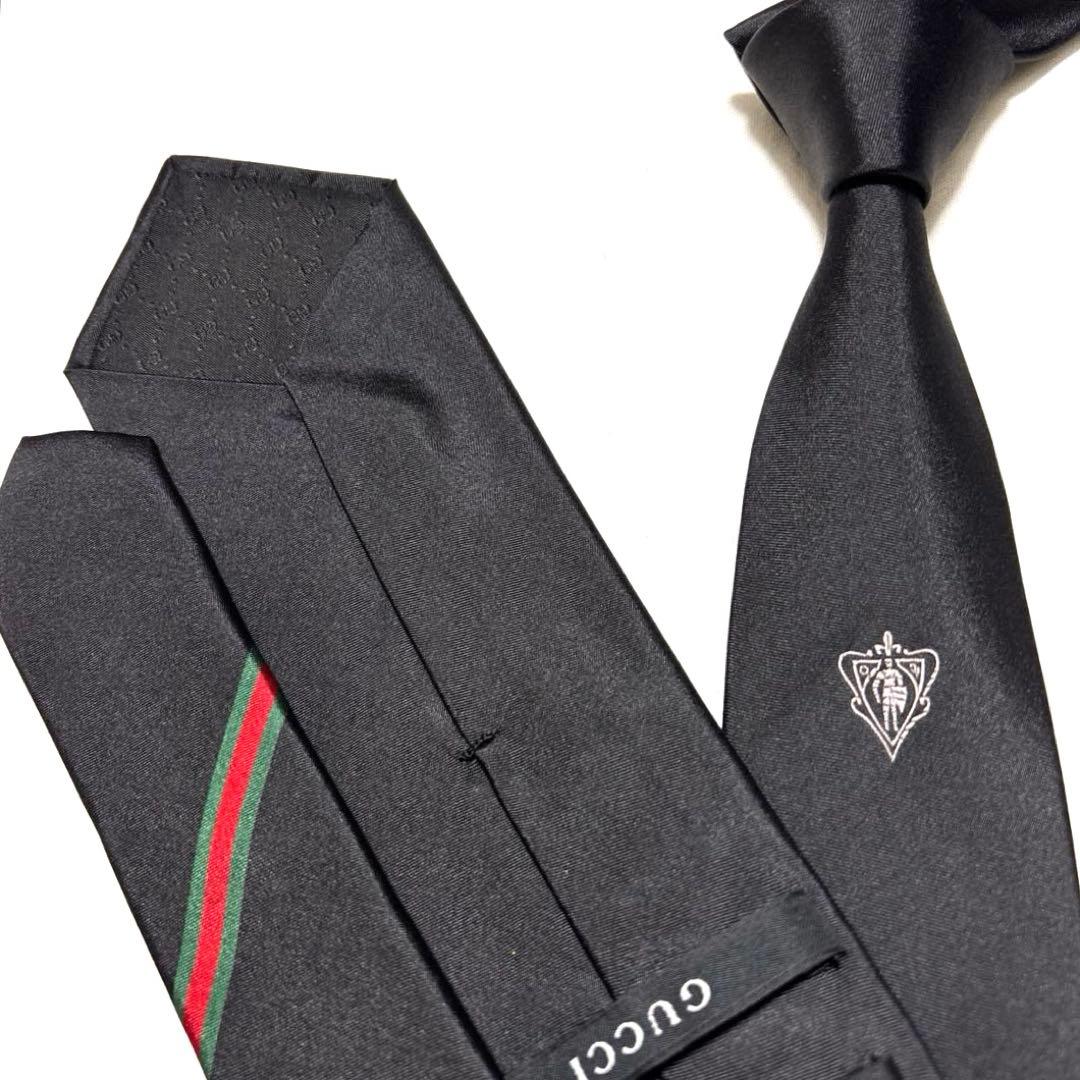 極美品　GUCCI グッチ　ネクタイ　ブラック　無地　ロゴ　シェリーライン　光沢