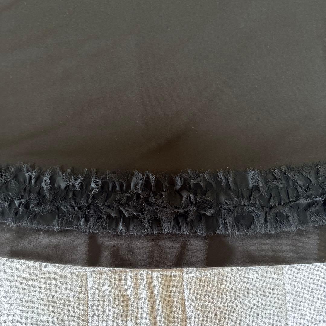 『未使用に近い』⭐️トクコプルミエヴォル⭐️黒地に魚刺繍ラグラン裾フリルチュニック❣️